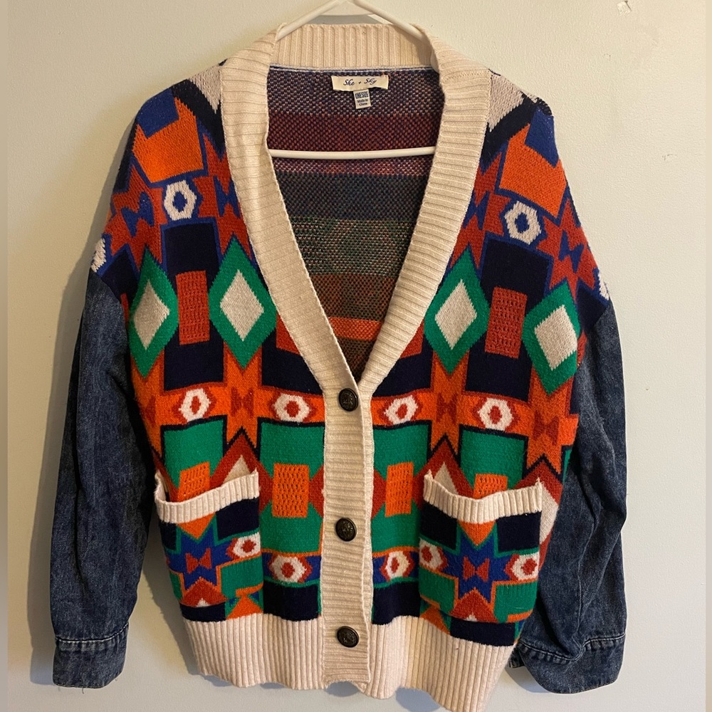 She and Sky sweater. Super cute pattern with denim arms. One size.